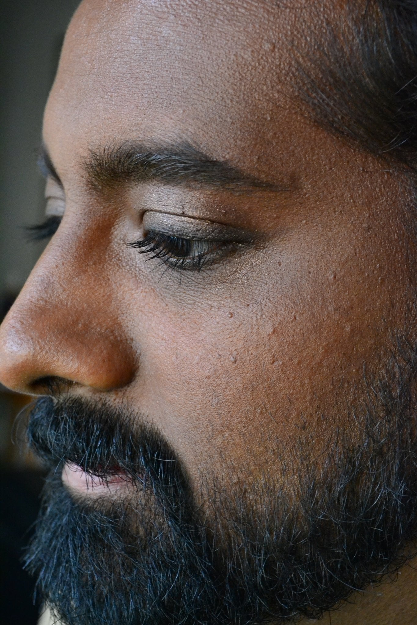 Model wearing The MATTERfying Foundation in Shade 20 Captivate, showcasing a flawless matte finish. His complexion appears smooth, even, and pore-blurred, highlighting the foundation’s full coverage and natural look