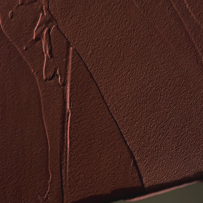 Video showing smooth swatches of The MATTERfying Foundation being applied in a range of shades. The creamy texture glides evenly across the surface, revealing a soft matte finish