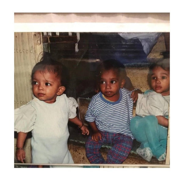 Tali in the orphanage before her parents picked her up